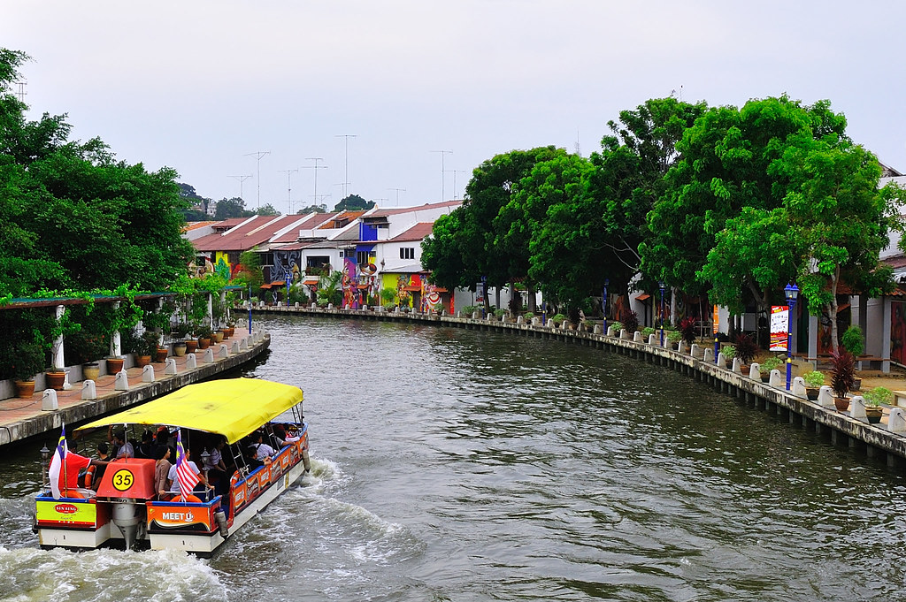 A Melaka River cruise boat departing the jetty