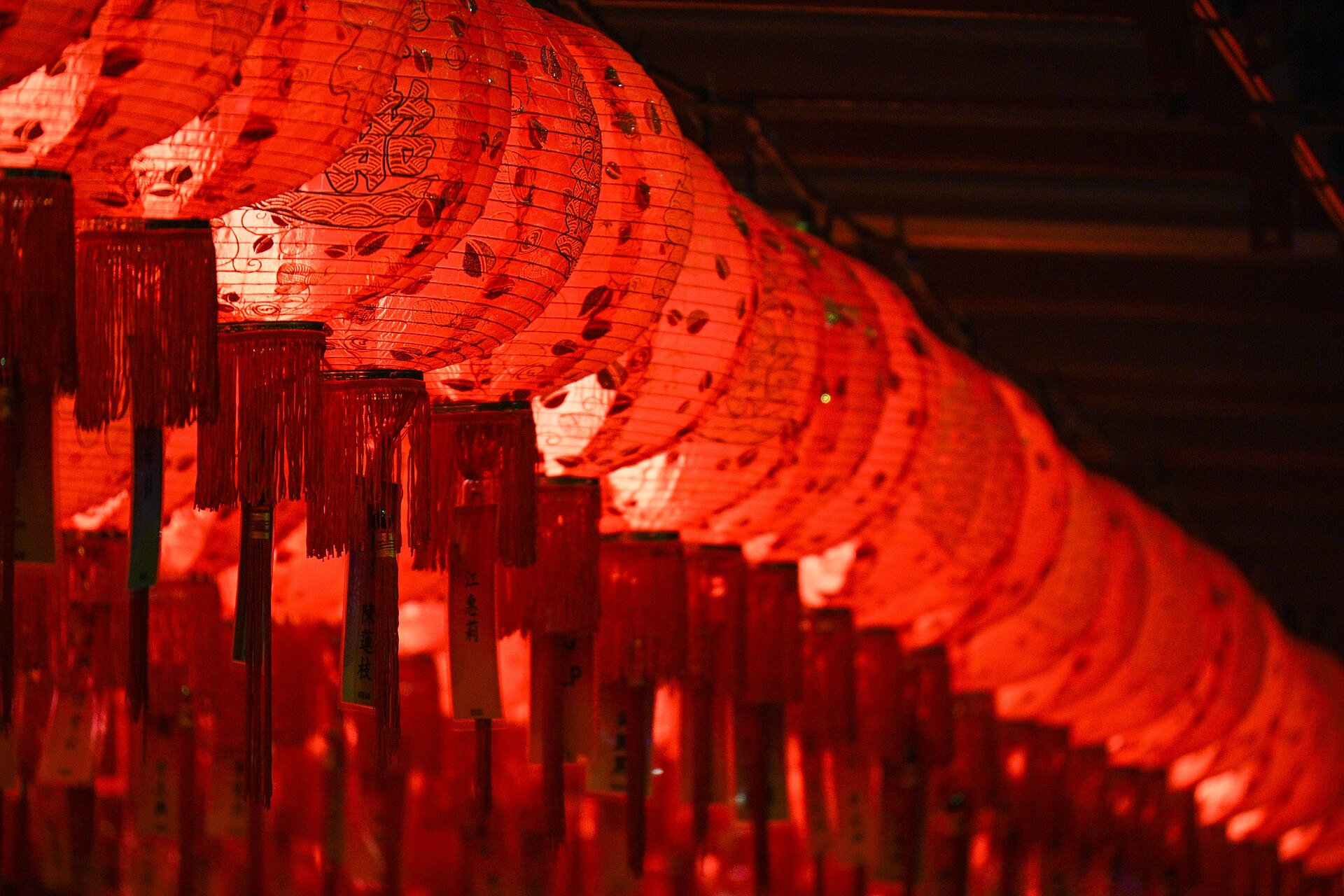 The Chinatown street market lit up in the evening