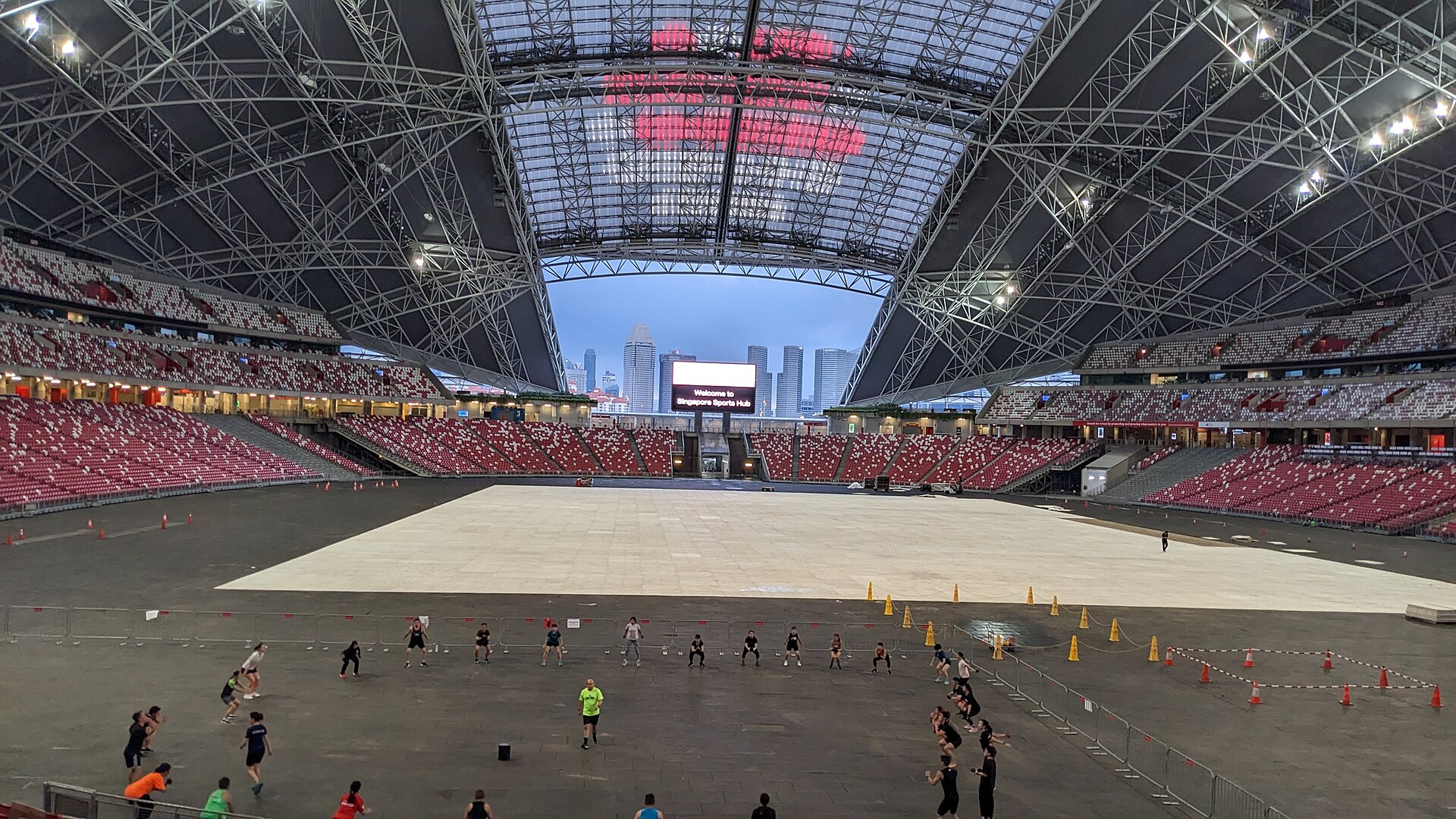 Inside the National Stadium Singapore, showing the seating bowl and dome roof